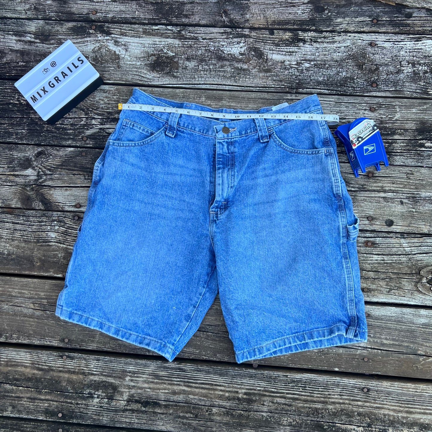 Wangler blue denim carpenter shorts
Size 34